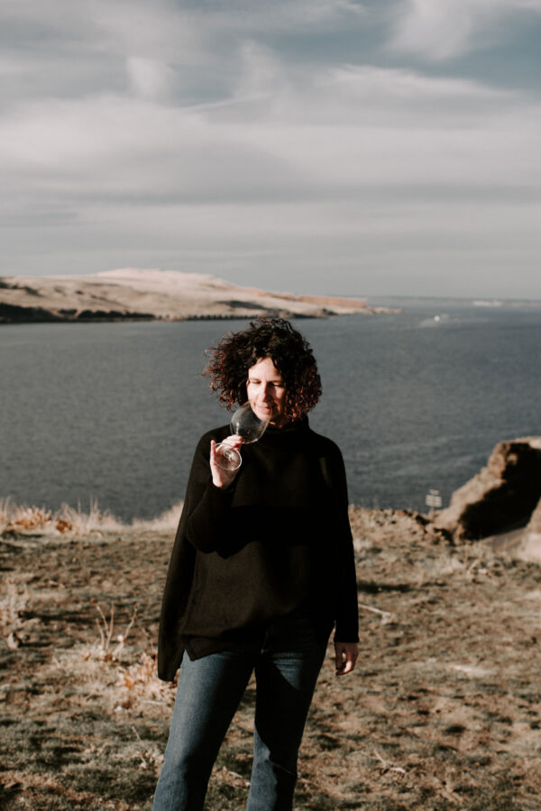 Person tasting wine on the Coast